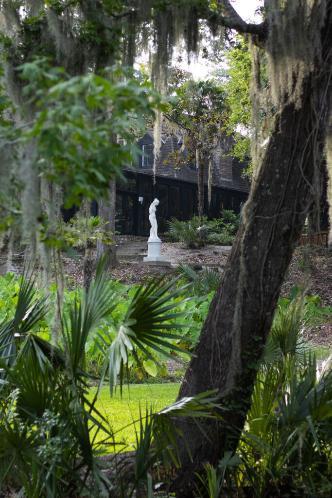 A picturesque statue overlooking a garden at Middleton place SC