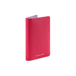 A vibrant fuchsia passport holder with sleek stitching, designed for women who love to travel in a bold, eye-catching color.