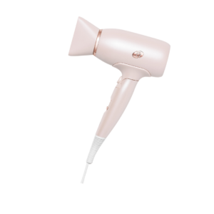 A sleek, compact travel hairdryer with a foldable handle and dual voltage settings, designed specifically for women who travel frequently. The lightweight design and stylish finish make it a perfect addition to any travel bag, offering convenience and functionality on the go.