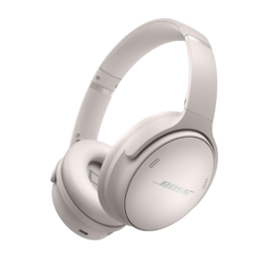 A pair of sleek, pearly white noise-canceling headphones designed for women who travel for long flights or busy commutes.