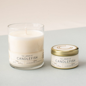 A luxury candle from Candlefish boutique featured in a birthday gift guide for Andre Brierre Jr.