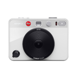 A Leica instant camera featured in a curated gift guide for men who love to travel.
