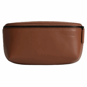 A brown leather belt bag for men, from a birthday gift guide for him.